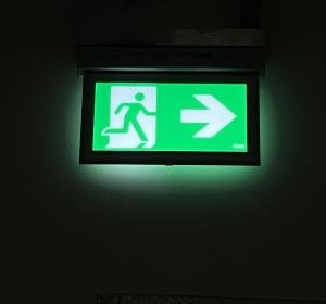 Illuminated emergency exit sign